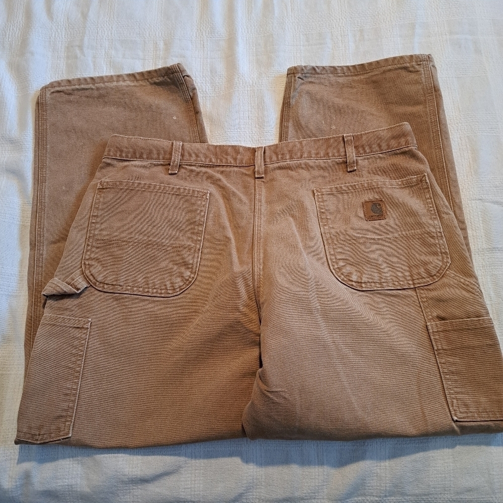 Carhartt men's size B11 brown dungaree fit worn pants, have work stains no holes